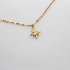 Necklace Length Length to choose from: 40 + 5cm (15.7 + 1.9inch) 45 + 5cm (17.7 + 1.9inch) 50 + 5cm (19.6 + 1.9inch) Tiny North Star Necklace with a small cubic zirconia stone in the center. Dainty Star pendant is suspended on a chain whose length is regulated. You can wear both 40 and 45 centimeters. The necklace is made of sterling silver and plated with 24k gold. What is Gold Vermeil Gold Vermeil - is genuine .925 sterling silver that has been expertly plated with a thick layer of 14k-24k gol North Star Necklace, Starburst Necklace, Starburst Earrings, Necklace Choker, Cool Necklaces, North Star, Star Pendant, Star Necklace, Silver Stars