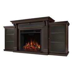 an entertainment center with a fire place and shelves on the sides, in dark wood