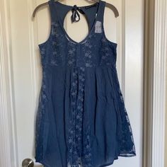 Abecrombie & Fitch Sleeveless Embroidered Lace Mini Dress Navy Size Xs Brand New With Tag The Dress Is A Baby Doll Design, Fits To Size Xs And Small Fully Lined 55% Cotton 45% Viscose Panels Of Crinkle Cotton And Embroidered Mesh V Neck Front, Round Back Finishing With A Tie 11'' Across Shoulders 16.5'' Across Armpits 36.5'' From Shoulder To Hem Longest Point 31'' From Shoulder To Hem Shortest Point I Have 2 More Dresses This Style, New With Tags In Dusty Rose And Ivory Colors All Items On My Li Boho Shift Dress, Doll Design, Crinkle Cotton, Abstract Dress, Summer Bodycon Dress, Mesh Bodycon Dress, Chevron Dress, Knitted Bodycon Dress, Lace Bodycon