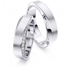 two white gold wedding rings with diamonds