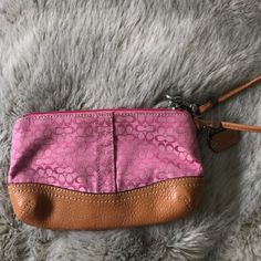 Looks Brand New! A Cute Pink With A Leather Brown Bottom Trendy Pink Travel Coin Purse, Trendy Pink Coin Purse For Travel, Pink Handheld Pouch For Everyday Use, Pink Wallets For Everyday Use In Spring, Trendy Pink Clutch For Everyday Use, Trendy Pink Clutch For Daily Use, Trendy Pink Everyday Clutch, Pink Coin Purse With Removable Pouch, Trendy Pink Pouch Coin Purse