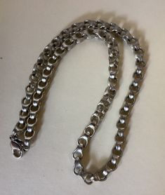 "Monet stainless steel color or dark silver color rolo/belcher/cable chain necklace  Approximately 18 1/4\" with clasp x 5/16\" w.  Marked: Monet tag ( copyright symbol Monet )   Very good condition  07/11/23 1338" Nickel-free Silver Link Necklace, Nickel-free Link Silver Necklaces, Silver Nickel-free Link Necklaces, Everyday Silver Rolo Chain Necklace, Silver Rolo Chain Necklace For Everyday, Modern Stainless Steel Chain Necklace, Modern Round Stainless Steel Chain Necklace, Metal Necklaces With Rolo Chain, Gunmetal Link Jewelry In Stainless Steel