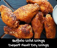 buffalo wild wings on a grill with ranch dressing in the background and text overlay saying buffalo wild wings desert treat - dry wings