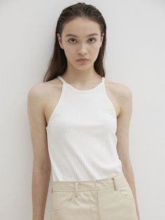 Editor's NotesThe Express TankTop is a sleeveless ribbed top that you can wear daily with a soft touch. - Tencel blendedmaterial- Sleeveless- Slim silhouette- Ribbed structure Measurements(in.)Size: OneSize(XS-M)- Total Length:21.25in.- Neck: 7.87in.- Chest: 13.38in.- Hem: 13.38in. Model Info:(Katerina) Height 5' 74, Wearing a size One               Composition &Care- Fabric: 81%Tencel, 10% Span, 9% Wool- Dry CleanRecommended- Hand Wash at 30Degrees- Use LiquidNeutral Detergent Designer-by Theballon White Ribbed Sleeveless Camisole, White Sleeveless Tank Top With Ribbed Neckline, Spring Ribbed Camisole Top, Ribbed Camisole Tank Top For Spring, Ribbed Camisole Tops For Spring, Spring White Tank Top With Ribbed Neckline, Spring Ribbed Tank Camisole, Spring Ribbed Cami Tank Top, Spring Ribbed Cami Top