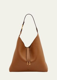 Get free shipping on Chloe Marcie Grained Leather Hobo Bag at Bergdorf Goodman. Shop the latest luxury fashions from top designers. Calf Leather Tote Shoulder Bag With Gold-tone Hardware, Designer Textured Leather Hobo Tote Bag, Designer Textured Leather Hobo Bag For Travel, Luxury Textured Leather Hobo Bag For Shopping, Brown Pebbled Leather Hobo Bag For Everyday, Designer Textured Leather Hobo Bag For Shopping, Luxury Textured Leather Hobo Tote Bag, Brown Pebbled Leather Hobo Bag For Travel, Classic Bucket Bag With Gold-tone Hardware For Shopping