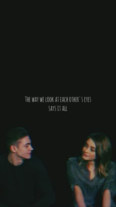 two people sitting next to each other on a black background with the words, the way we look at each other's eyes says it all