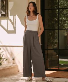 Relaxed Trouser Dark Moss Made from 100% textural raw silk for an effortless look that's equally polished and comfortable. With tailored pleats that seamlessly transition into a wide-leg silhouette, the Relaxed Trouser is the definition of California cool. Pair it with a classic cami or tee or embrace an oversized aesthetic from head-to-toe with your favorite lightweight knit. Elegant Wide Leg Pants With Straight Hem For Daywear, Elegant Wide Leg Pants With Straight Hem, Elegant Linen Wide Leg Pants For Daywear, Oversized Aesthetic, Relaxed Trousers, Jenni Kayne, California Cool, Jumpsuit Trousers, Lightweight Knit