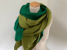 Muslin cloth XXL wrap scarf triangle loop scarf green kiwi olive cotton scarf stole summer cloth triangular scarf Beautiful light cloth You will love this scarf! It's a big square, wonderfully soft and it's nice and big to snuggle up in. By using two different muslin materials, this cloth is particularly pleasantly light and completely convertible. Dimensions: approx. 133 x 133 cm Material: 100% cotton Care: 30 degrees gentle wash Spring Green Shawl For Beach, Green Shawl For Beach, Green Shawl For Beach In Spring, Green Shawl For Spring Beach Outings, Green Shawl For Spring Beach Occasions, Green Casual Scarves One Size, Casual Green Scarves One Size, Casual Green Scarf, Spring Green Cotton Scarves