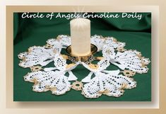 a crochet doily with a candle on it and the words circle of angels crocheting dolly