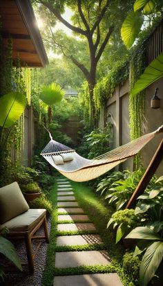 a hammock hanging in the middle of a garden