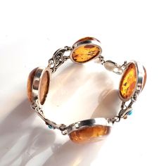 Large oval honey amber link bracelet in sterling silver Luxury Amber Bracelet For Gift, Luxury Amber Oval Beads Jewelry, Amber Bracelet, Amber Beads, Amber Jewelry, Amber Color, Gift Store, Silver Frame, Turquoise Beads