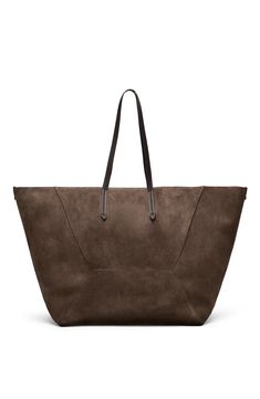 The refined suede is a compact leather with a soft, velvety texture. A leather lining completes the look of the bag. Magnetic snap closure Double handle Leather lining Detachable internal pochette with zipper Nickel-free monili decoration Bag is 24,41" long, 11,42" wide and 12,60" high Chic Suede Bag For On-the-go, Chic Bag With Suede Lining And Top Handle, Chic Top Handle Bag With Suede Lining, Chic Bag With Top Handle And Suede Lining, Chic Double Handle Shoulder Bag With Suede Lining, Chic Shoulder Bag With Suede Lining And Double Handle, Chic Tote Shoulder Bag With Suede Lining, Chic Suede Bag With Suede Lining, Elegant Suede Bag With Leather Lining