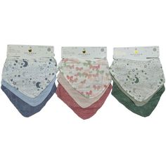 four bibs with different designs on them