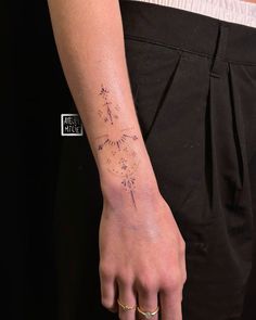 a person with a small tattoo on their arm