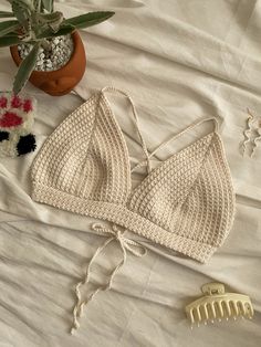 If you're looking for a quick weekend project, Verona is perfect for you! It is size inclusive, quick and easy crochet pattern that you can actually finish your bralette in a day, and the most beautiful part is you only have one tail end to weave in!  Materials needed: * size 2 or 3 yarn weight (100g - 300g for XS - XL) * recommended hook size on your yarn wrap * stitch markers * tape measure * scissors * tapestry needle Kindly contact me at crochetbymiee@gmail.com or @crochetbymiee.ph on Instag Tunisian Crochet, Crochet Bralette Pattern, Bralette Pattern, Easy Crochet Pattern, Crochet Bralette, Weekend Projects, Easy Crochet Patterns, Tapestry Needle, Tape Measure