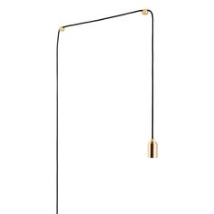 a black and gold floor lamp on a white background with the light bulb turned off