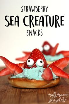 strawberry sea creature snacks on a wooden table