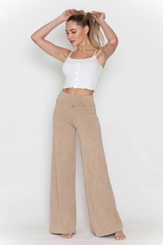 Discover the perfect blend of comfort and style with these Mineral Washed Wide Leg Stretch Pants! They feature a smooth banded waist for an easy pull-on fit, plus raw edge bottom hem and back pockets for added flair. Made in the USA with breathable and versatile Cotton/Spandex French terry fabric, these pants are the perfect alternative to jeans for all day everyday wear. Plus, they come in a flexible sizing range for regular, plus size, and curvy women. Inseam 32" inches Stay Sexy! Check out al Relaxed Bottoms With Elastic Waistband For Fall, Relaxed Stretch Solid Bottoms, Relaxed Stretch Pants For Fall, Spring Mid-rise Beige Wide Leg Pants, Mid-rise Beige Wide Leg Pants For Spring, Relaxed Stretch Wide-leg Pants, Relaxed Stretch Pants With Comfort Waistband, Stretch Wide Leg Pants For Everyday, Everyday Wide Leg Pull-on Bottoms