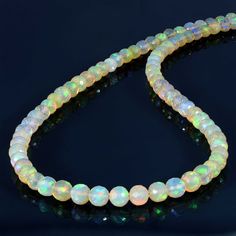 Ethiopian opal Shape- Round Faceted Size- 3.5-6 mm Length- 45 cm Weight- 70 ct. Metal- Sterling Silver 925 Ethiopian opal necklace-Round Faceted opal beads necklace-AAA Welo fire opal necklace-Beaded fire opal necklace -Natural Opal beads necklace All of my jewelry is designed and handcrafted by me. I love to experiment with many different designs and although I may make similar designs more than once, each piece of jewelry is truly one of a kind due to variations between gemstones and within my Spiritual Crystal Necklace With Faceted Beads, Faceted Round Beads Gemstones For Jewelry Making, Spiritual Faceted Beaded Necklaces, Spiritual Beaded Rondelle Crystal Necklace, Spiritual Round Beads Single Strand Gemstones, Spiritual Single Strand Crystal Necklaces With Round Beads, Spiritual Single Strand Crystal Necklace With Round Beads, Round Faceted Beads, Opal Choker