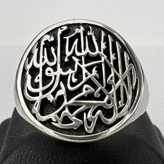 Shahada Ring, Islamic gifts, Eid gifts, Muslim gifts, Islamic jewelery, Kalima, Arabic Scripture, Jewelry Solid Sterling Silver 925! This ring is meticulously handcrafted by me, ensuring it is not a mass-produced factory item but rather an exclusive and unique piece. When you purchase this pendant, you can rest assured that you are the only one with this particular design.  Each pendant is made to order, requiring 3-4 days to complete, ensuring it meets the highest standards of craftsmanship.  W Scripture Jewelry, Islamic Jewelry, Eid Gifts, Islamic Gifts, Handmade Ring, Silver 925, Band Rings, Unique Pieces, Allah