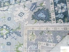 an area rug with several different colors and patterns