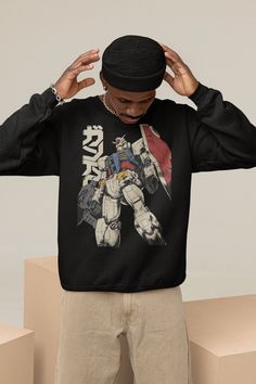 Unisex, Gundam Sweater, 90s Anime Shirt, Vintage Shirt, Robot Anime Lovers, Anime shirt, Japanese Manga Shirt, Retro Gundam Anime Sweatshirt Ideal for any situation, a unisex heavy blend crewneck sweatshirt is pure comfort. These garments are made from polyester and cotton. This combination helps designs come out looking fresh and beautiful. The collar is ribbed knit, so it retains its shape even after washing. There are no itchy side seams on these sweaters.  .: 50% cotton, 50% polyester .: Med Long Sleeve Shirt With Character Print For Streetwear, Casual Long Sleeve Tops For Cosplay, Harajuku Crew Neck Shirt With Cartoon Print, Harajuku Style Crew Neck Shirt For Streetwear, Long Sleeve Cotton Top For Cosplay, Anime Print Crew Neck Sweatshirt For Cosplay, Crew Neck Shirt With Cartoon Print For Streetwear, Retro Anime Print Tops For Fan Merchandise, Retro Anime Print Tops For Fans