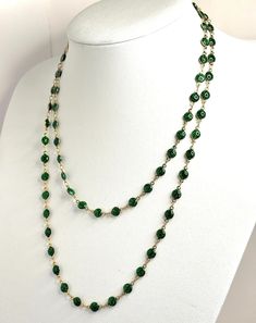 Extra Long Emerald Green Powder Glass Beaded Necklace - Gold Plated  - Gold filled Clasp - 40 Inches Elevate your style with our luxurious extra-long glittery emerald green beaded necklace. This captivating piece showcases deep emerald green glittery beads, exuding elegance and sophistication with every wear. Key Features: Length: 40 inches (101.6 cm) - ideal for layering or making a bold statement Design: Gold Filled Clasp to obtain the look in the pictures, wear as single chain or open the cla Elegant Green Beaded Chain Necklace, Green Beaded Chain Necklace As Gift, Green Beaded Chain Necklace For Jewelry Making, Green Wire Wrapped Jewelry For Party, Green Double Strand Beaded Chain Necklace, Gold Necklaces With Oval Beads For Party, Gold Gemstone Beads Necklace For Party, Party Necklaces With Oval Faceted Beads, Gold Necklace With Gemstone Beads For Party