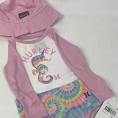 Adorable Hurley 3 Pieces Swim Set: *Brand New With Tags! Size: 18mos Color: Pink & Multi-Colors -Long Sleeve Rashguard Detailed With Multi-Color Seahorse, Hurley Name Across The Top & Hurley Symbol At The Bottom. -Muti-Color Matching Bikini Bottoms With The Hurley Symbol -Matching Pink Bucket Hat With Adjustable Velcro Strap & Hurley Symbol - Spring Adjustable Swimwear With Uv Protection, Adjustable Swimwear With Uv Protection For Spring, Summer Swimming Sets With Uv Protection, Summer Beach Sets With Uv Protection, Uv Protection Swim Sets For Summer, Playful Sets For Pool And Beach Season, Playful Pool Sets For Beach Season, Uv Protection Sets For Swimming In Summer, Uv Protection Sets For Summer Swimming