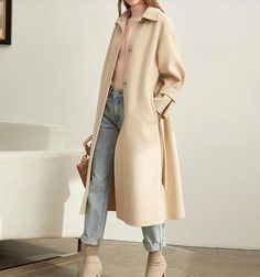 Product Description: This is a handmade cashmere coat high grade fabric,cashmere fabric.also could be custom made with any size and other colors,please feel free to contact with me if you want custom it. Material: wool 80%- 90% Size: S: Bust : 110 cm shoulder:51cm Sleeve:50cm Length:107 cm M: Bust : 114 cm shoulder:52cm Sleeve: 51 cm Length: 107 cm L: Bust : 118 cm shoulder:53cm Sleeve:52 cm Length:107 cm XL: Bust :122 cm shoulder:54cm Sleeve:53 cm Length:107 cm Long Beige Outerwear For Winter, Winter Long Single Breasted Outerwear, Fitted Beige Wool Coat For Fall, Beige Long Outerwear For Winter, Winter Long Single-breasted Outerwear, Single Breasted Long Winter Outerwear, Long Single-breasted Winter Outerwear, Wool Long Sleeve Sweater Coat For Office, Office Outerwear With Stand Collar For Fall