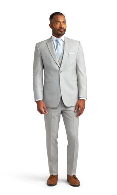 A slim light grey suit with one button and a peak lapel. Gray Notch Lapel Tuxedo, Gray Notch Lapel Blazer For Wedding, Gray Notch Lapel Tuxedo For Wedding, Gray Slim Fit Suit With Notch Lapel, Gray Fitted Suit For Groom, Gray Slim Fit Notch Lapel Suit, Gray Fitted Tuxedo With Notch Lapel, Elegant Gray Single-button Suit, Gray Fitted Suit With Single Button