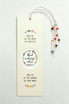 a bookmark with some beads on it and a quote that says,'keep me alive