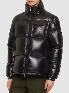 Find MONCLER Montbeliard Nylon Laque Down Jacket on Editorialist. Detachable hood with button closure. Front two-way zip closure . Logo details on chest. Two side pockets. One breast pocket. Down feather filling. Nylon lining. Model is wearing a size6 Bubble Jacket Men, Mens Black Jacket, Shiny Jacket, Color Block Jacket, Sport Swimwear, Sports Sweatshirts, Down Feather, Streetwear Men Outfits, Cool Jackets