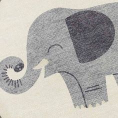 an elephant rug is shown in grey and white with black accents on the bottom half