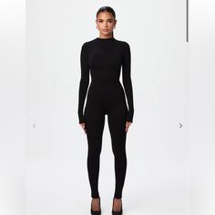 Size Xl Brand New With Tags Jumpsuit Black High Stretch Full Length Jumpsuits And Rompers, Black Fitted Full Length Jumpsuits And Rompers, Black High Neck Jumpsuits And Rompers, Black High Neck Jumpsuit With High Stretch, High Stretch Black High Neck Jumpsuit, Sleek Black Long Sleeve Jumpsuits And Rompers, Black High-neck High-stretch Jumpsuit, Black High-stretch High Neck Jumpsuit, High Stretch Moisture-wicking Jumpsuits For Yoga