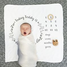 a baby wrapped up in a blanket on top of a carpet with the caption instagram