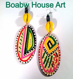 Hand painted with acrylic paints and glossed with a clear gloss for protection. Made out of a lightweight wood. Size 5in Hand Painted Yellow Artsy Earrings, Yellow Hand Painted Artsy Earrings, Artistic Hand Painted Yellow Earrings, Artsy Yellow Earrings With Artistic Design, Handmade Yellow Artsy Earrings, Handmade Artsy Yellow Earrings, Artistic Handmade Yellow Earrings, Artisan Hand Painted Earrings For Festival, Artistic Hand Painted Earrings For Festival