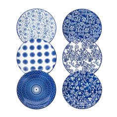 four blue and white plates sitting on top of each other