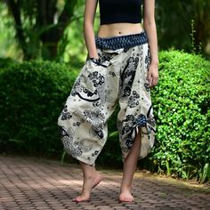 "White Koi Fishes Traditional Samurai pants, Wrap pants, Tie waist pants, Thai Fisherman pants, Kimono pants, Unisex Printed Cotton Samurai pants has one Pocket in front for storing item like Mobile phone, Wallet or Money. Cotton Baggy pants are great for any Occasion, Chillout, FreeStyle, Yoga, Traveling, Dancing, Going to Festivals, Working out, Martial arts, Etc... This item is made of high-quality cotton in the north of Thailand. Printed with Special technique and making with Craftsmanship f High Waist Harem Pants With Pockets For Beach, Beach High Waist Harem Pants With Pockets, Summer High Waist Yoga Pants With Pockets, High Waist Yoga Pants With Pockets For Summer, White Harem Bottoms For Spring, White Harem Bottoms With Elastic Waistband, Traditional White Wide Leg Bottoms, Harem Bottoms With Pockets For Summer, Summer Harem Bottoms With Pockets