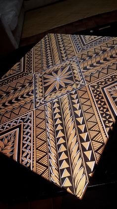 an intricately designed wooden table top