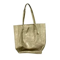 A Lightweight Shopper Tote Bag That Is Tall And Roomy With Modern Clean Lines For Understated Chic. Soft Textured Leather With Double Handles And An Internal Zippered Pouch. This Handbag Is Beautifully Handcrafted Of High-Quality Top-Grain Leather And Entirely Made In Italy. Gold Modern Rectangular Hobo Bag, Modern Gold Bags For Everyday Use, Modern Gold Hobo Bag For Shopping, Gold Leather Bag For On-the-go, Gold Soft Leather Bag For On-the-go, Modern Gold Shoulder Bag For Daily Use, Gold Hobo Bag With Gold-tone Hardware For Daily Use, Chic Gold Hobo Bag With Large Capacity, Modern Gold Tote Shoulder Bag