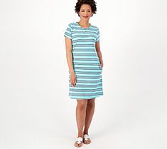 A summertime staple, this timeless T-shirt dress is an everyday option that embodies the three Cs: casual, comfortable, and cute. From Sport Savvy. Casual Cotton T-shirt Dress With Relaxed Fit, Cotton Short Sleeve Dress For Day Out, Relaxed Fit Crew Neck T-shirt Dress For Spring, Casual Cotton T-shirt Dress For Spring, Casual Cotton Knee-length Short Sleeve Dress, Casual Short Sleeve Mini Dress For Vacation, Relaxed Fit Cotton Short Sleeve Knee-length Dress, Crew Neck Cotton Beach Dress, Cotton Crew Neck Beach Dress