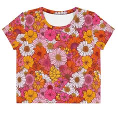 Looking for your new favorite addition to your wardrobe? Then you don't have to look any further, because this printed crop T-shirt is sewn to fit exactly. Plus, the original all-over design is definitely worth showing off, so don't hesitate to buy one of these tees - they're meant to be adored. * 95% polyester, 5% elastane (fabric composition may vary by 1%) * Premium knit, mid-weight jersey * Four-way stretch fabric that stretches and recovers in the crotch and length directions * Regular fit Retro Pink Printed T-shirt, Orange Cotton Top With Retro Print, Vintage Summer Tops With All Over Print, Retro Orange Printed Top, Vintage Cotton Tops With All Over Print, Pink Graphic Print Cropped Shirt, Vintage Cotton Top With All Over Print, Retro Short Sleeve Crop Top, Vintage Short Sleeve Top With All Over Print