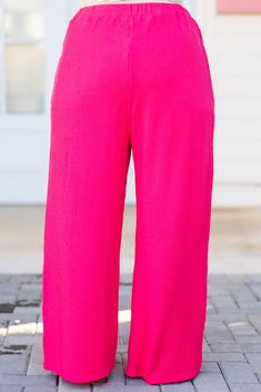 You know you need these beauties in your life! These pants in hot pink offer a flowy fit for both casual outings and comfortable lounging! The bold color adds versatility to any wardrobe! Expertly crafted and perfect for all-day wear! 67% Polyester, 25% Rayon, 8% Spandex Pink Solid Color Bottoms For Loungewear, Pink Solid Color Loungewear Bottoms, Casual Pink Wide Leg Pants For Loungewear, Pink Long Pants With Solid Color, Stretch Pink Bottoms Solid Color, Pink Wide Leg Loungewear Pants, Stretch Pink Pants, Pink Wide Leg Pants For Loungewear, Pink Stretch Pants Solid Color