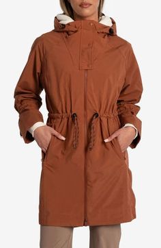 Travel confidently and comfortly in wet weather with this waterproof rain jacket designed for easy packing and breathability. 35" front length; 38" back length (size Medium) Drawcord-toggle hood Drawcord-toggle waist Waterproof Lined 100% polyester Machine wash, tumble dry Imported Utility Parka For Rainy Weather In Fall, Utility Parka For Fall And Rainy Weather, Fall Utility Parka For Rainy Weather, Travel Windbreaker With Detachable Hood, Utility Outerwear With Functional Drawstring For Fall, Utility Waterproof Raincoat For Spring, Nylon Raincoat With Pockets For Rainy Season, Spring Utility Waterproof Raincoat, Fall Windbreaker With Drawstring Hood For Rainy Weather