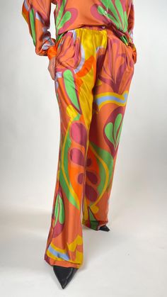 Palazzo Pants, made of light and cool chiffon satin fabric, can be combined with the Long Kimono and Shirt set. Concealed zipper on the side. It doesn't show inside. Side waist parts are elastic. Pleated detail. High waist. Palazzo fit on the hips with wide cut legs. PRODUCT FEATURES: Pants Length: 110 cm Waist Size: 82 cm - 86 cm Model Height: 180 cm Model Size: 38 Spring Stretch Satin Bottoms, High-waisted Silk Pants For Summer, Silk Party Trousers, Silk Bottoms For Summer Party, Summer Silk Bottoms For Party, Multicolor Wide-leg Party Pants, Fitted Silk Wide Leg Pants For Summer, Satin Pants With Elastic Waistband, Satin Trousers For Party