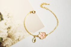 Super dainty Personalized Cherry blossom bracelet. ▶▶ You can make this necklace personal choosing the quantity of letter leaf from option. Please leave a note for the desired letters in 'add your personalization' ▶ Material - Gold plated over brass, Pearl ▶ Chain Length - 5 ~ 9 inches (Please choose it from option) ▶ charm measure - Flower H. 14mm x W. 13mm, Initial leaf ▶ The matching necklace available https://www.etsy.com/listing/196300602/cherry-blossom-necklace-sakura-necklace The matching Minimalist Bracelets With Flower Charm As Gift, Dainty Flower Shaped Personalized Bracelets, Elegant Rose Gold Bracelet Perfect As Gift For Mom, Elegant Rose Gold Bracelet As Gift For Mom, Dainty Hypoallergenic Charm Bracelet For Weddings, Elegant Rose Gold Bracelet For Mom, Elegant Flower Charm Bracelet Gift, Flower Charm Bracelet As A Gift, Dainty Handmade Bracelets For Bridesmaids