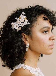 Beautifully handmade in our studio, this lovely bridal comb features hand sculpted blossoms and buds. Tiny Austrian crystal details sprinkled throughout and lovely brass leaves complete the look. -Adorned portions measures approximately 2.5" Wide; 3.5" Long -Austrian crystals -Handmade in our studio -Available in ivory/gold as pictured -Finished on a gold plated wire comb -Style 2130 earrings sold separately Natural Hair Wedding, Natural Wedding Hairstyles, Shaped Crystals, Curly Wedding Hair, Flower Comb, Hair Adornments, Wedding Hair Inspiration, Bridal Comb