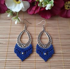 Give a boho touch to your look with these long macrame earrings handwoven with high-quality waxed thread. These earrings are lightweight and perfect to wear every day or for a special occasion. They are also nickel free and lead free brass ear wires so they won't provoke allergies. If you want to see more macrame earrings options click here: https://www.etsy.com/shop/Macrastur?ref=seller-platform-mcnav§ion_id=30875989 ※ MEASUREMENTS ※ - Length: 81 millimeters / 3.18 inches with the ear wire - Wi Woven Earrings, Bohemian Macrame, Macrame Earrings, Earrings Bohemian, Macrame Jewelry, Jewelry Unique, Earrings Long, Birthday Gift For Her, Earrings Dangle