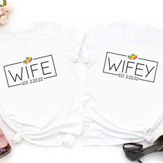 two t - shirts with the words wife and husband on them next to some flowers