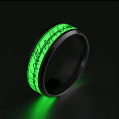 glow in the dark ring with handwriting on it